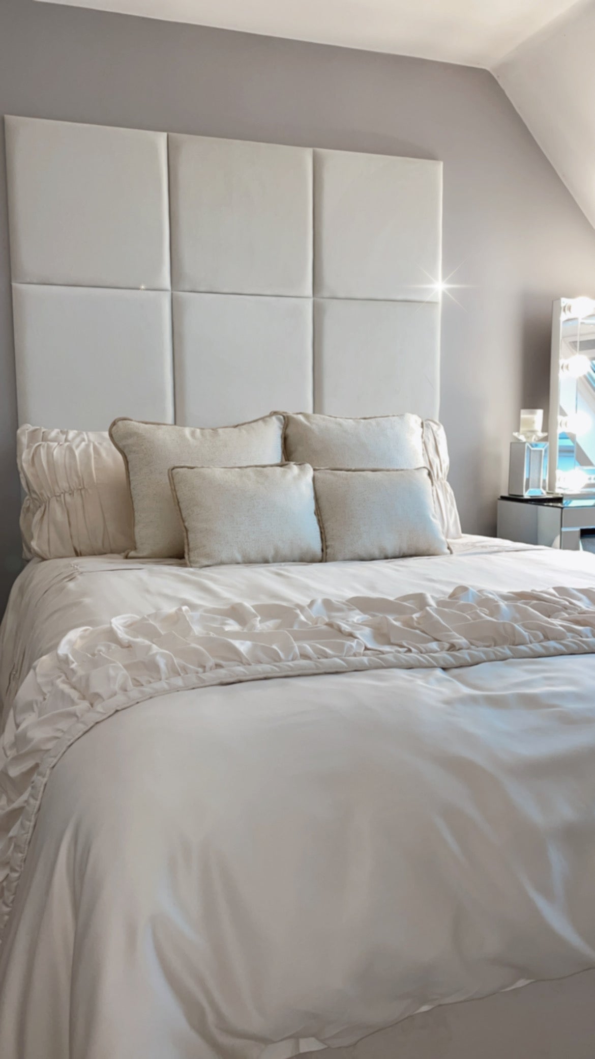 50 x 50 Velvet wall panels in a 3 x 3 configuration, shown in a bedroom environment with double bed and a bedside cabinet.