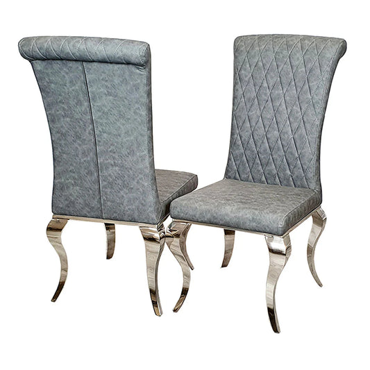 Two silver chairs, facing alternative directions. The two chairs are on a white background.