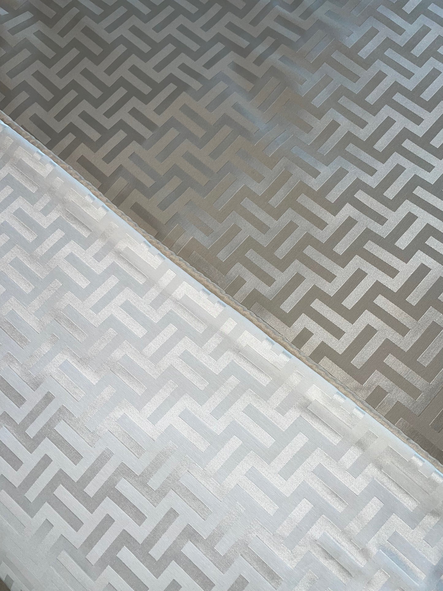 Showing pattern of Florence Reversible Throw in Beige and White