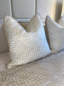 Florence Cushion in Beige or White, shown with the matching throw.