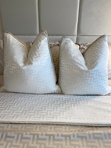 2 x Florence Cushion in Beige or White, shown with the matching throw.